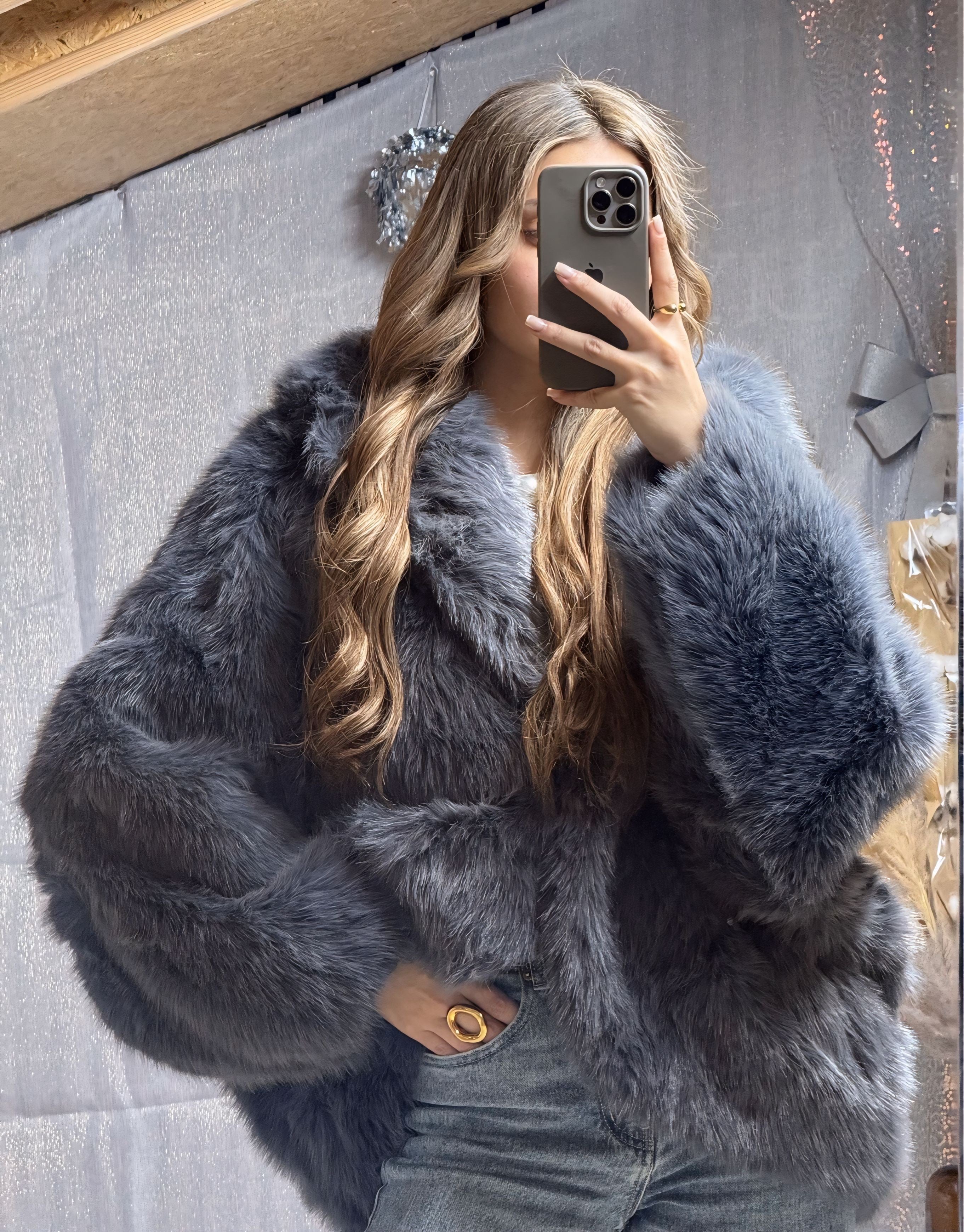 Fourrure à capuche Gris